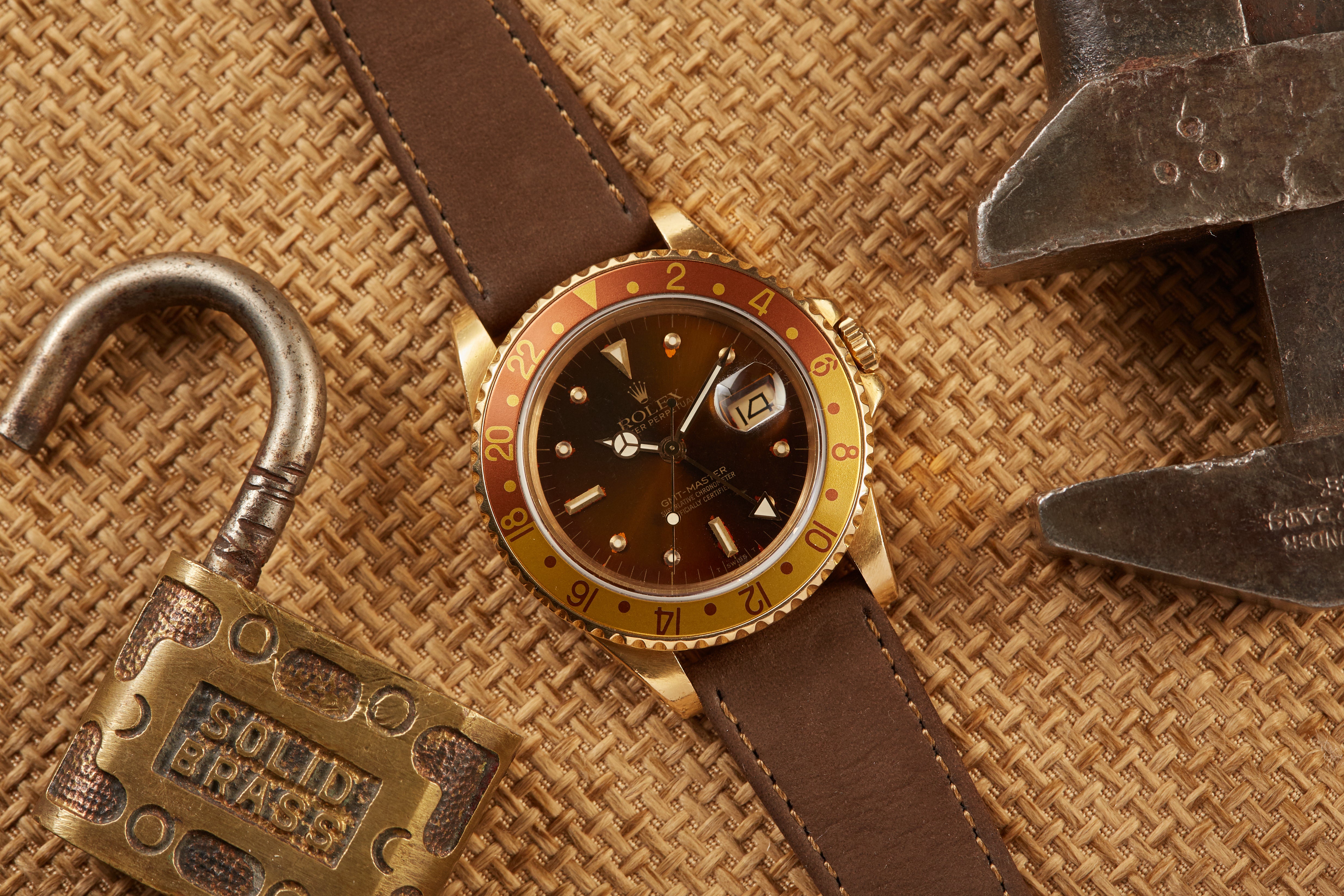 Rolex 18k GMT Master Rootbeer Analog Shift